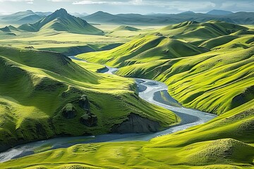 Breathtaking aerial view of a lush green valley showcasing a winding river and stunning waterfall