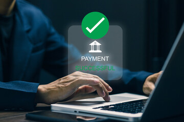 Businessman using a laptop with a digital confirmation message showing “Payment Successful,” symbolizing secure online transactions, digital banking, and financial technology