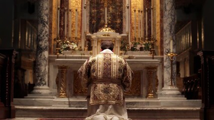 An image of the priest genuflecting before the altar as a sign of adoration and reverence for Christs presence in the Eucharist.