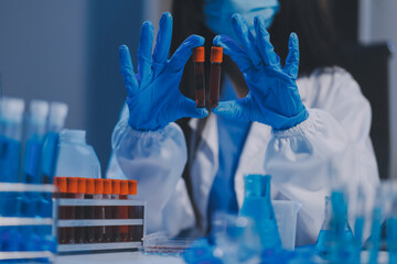Research, experiment and medical trial being done by a scientist in a lab, science facility or...