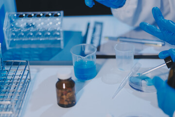 Research, experiment and medical trial being done by a scientist in a lab, science facility or...