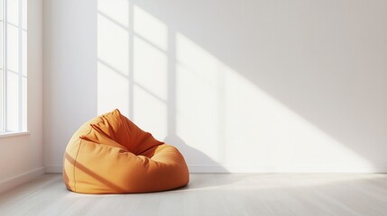 Minimalist and cozy interior with an orange bean bag chair and sunbeams from the window.