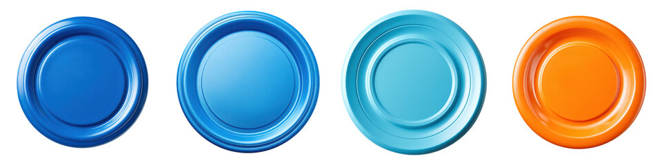 Colorful modern plates and tableware arranged on a plain background