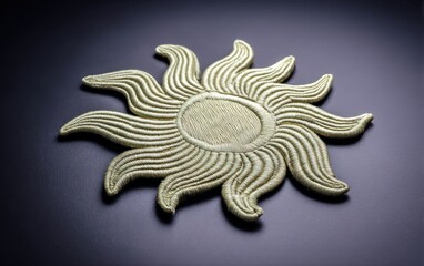 Embroidered sunburst design