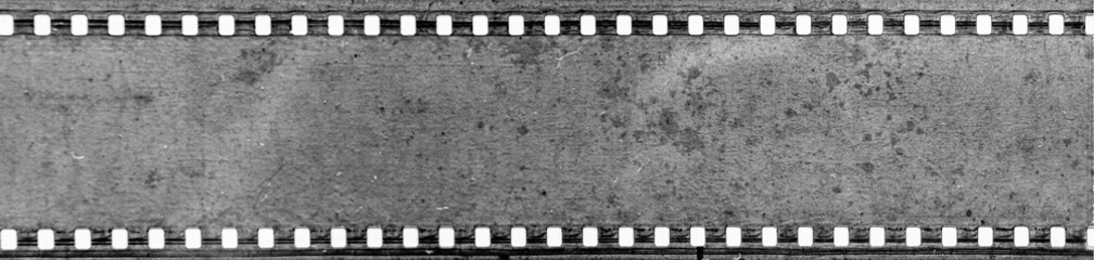 Vintage black and white film strip with blank frame border pattern
