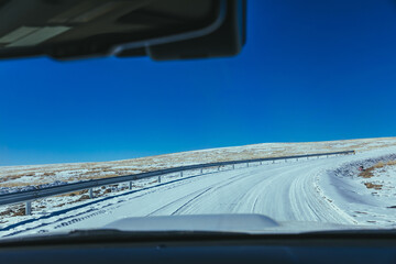 Driving off road car in high altitude mountains in tibet, China
