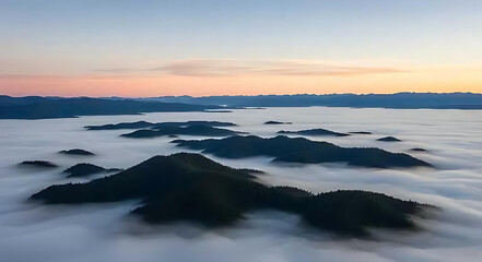 Fototapeta premium Breathtaking Sunrise Over Mountain Range with Foggy Valleys and Vibrant Sky