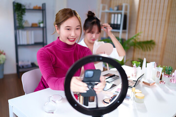 Asian Women Beauty Vloggers with Ring Light Recording Makeup Tutorial for Social Media Online Content Creation
