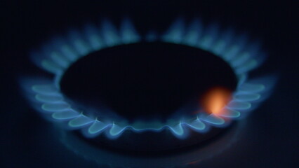 A Dramatic CloseUp Shot of a Gas Flame on the Kitchen Stove for an Artistic Perspective