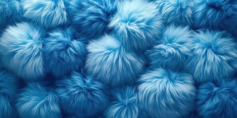 Fluffy blue fur balls creating a soft and cozy patterned texture