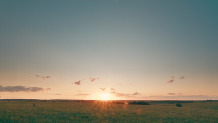 A Beautiful Golden Sunrise Over the Serene and Tranquil Landscape Awaits You Today