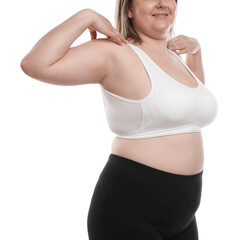 Weight loss. Plus size woman on white background, closeup
