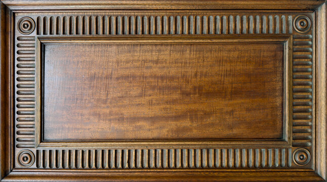 Elegant Antique Wooden Frame with Ornate Carvings and Glossy Finish. Wood Texture Background with copy-space.