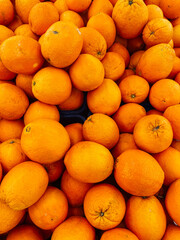 lots of orange fruits for food as background