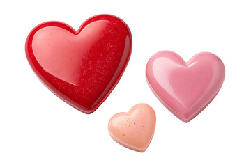 Fototapeta premium Three glossy heart shapes for valentine's day on transparent background