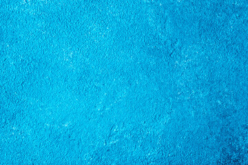 blue textured wall surface background with rough paint texture