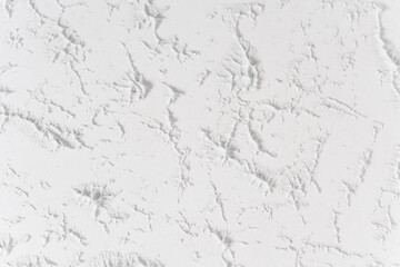 white textured wall surface close up background