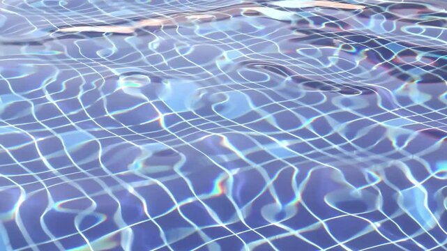 Clean water in a swimming pool with a blue bottom.
