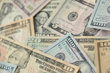 Stack of dollar bills. Hundred, fifty, twenty, ten, five dollars banknote close up