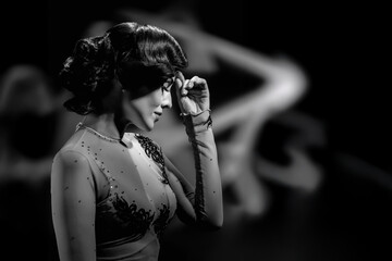 Pretty sensual woman in elegant evening dress, black and white photography in retro style. Woman in...