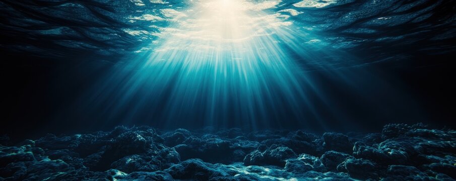 Underwater background with sun rays shining through the water surface underwater nature ocean.