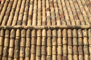 Old colorful mediterranean tile rooftop closeup