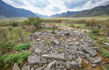 Ancient burials in the Altai mountains on terrace of the Katun and Bolshoy Yaloman rivers.