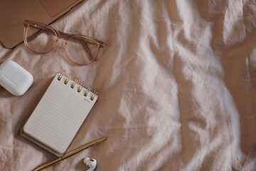 Flat Lay of Office Supplies on Soft Fabric