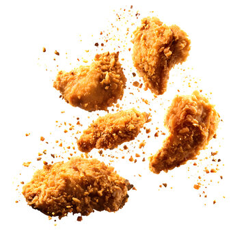 Fried chicken pieces in explosion isolated on transparent background