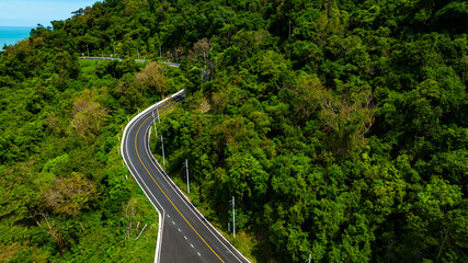 Aerial view of  landscape view from flying drone in Nature as coastline of road way scenic view
