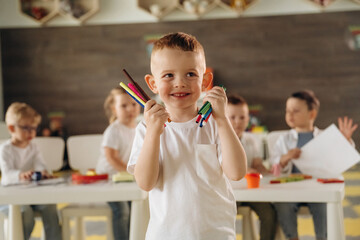 Group of children are in the kindergarten
