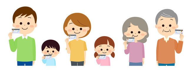 マイナンバーカードを手に持つ人々