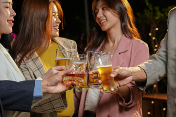 food and drink male friends are happy drinking beer and clinking glasses at a bar or pub.