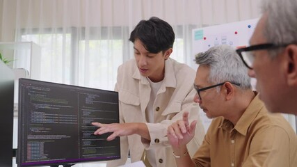 Asian Instructor Teaching Senior in Software Programming and Training Collaboration - Powered by Adobe