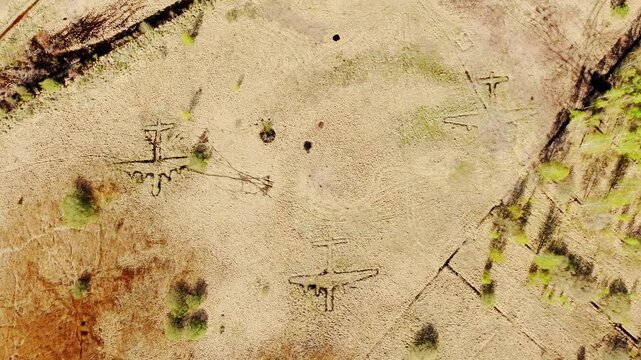 Soviet-era decoy airfield with visible bomber plane trenches near Liepaja Latvia