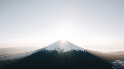 Fototapeta premium Mount Fujis sunlit snowy peak beauty
