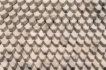 Texture of the surface of a brown wooden board, wooden plank. Unusual wooden background.