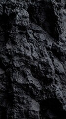 Close-up of a rough, dark asteroid surface