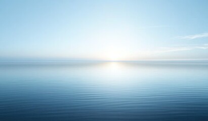Obraz premium Serene, tranquil ocean sunrise. Gentle pastel blue tones blend seamlessly, creating a peaceful ambiance