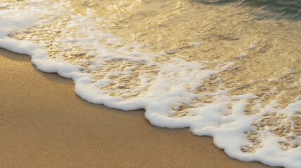 Foamy waves gentle touch on sand