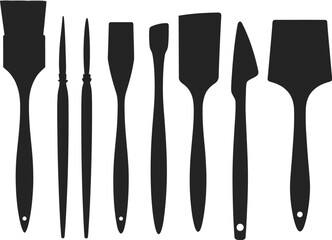 Black and White Silhouette: Assortment of Artist Brushes and Palette Knives for Painting