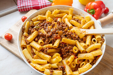 Homemade pasta pan with spicy bell pepper meat sauce