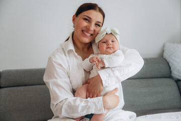 Woman is with her little toddler baby daughter