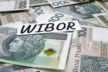 Inscription WIBOR next to polish money. WIBOR is Warsaw Interbank Offered Rate