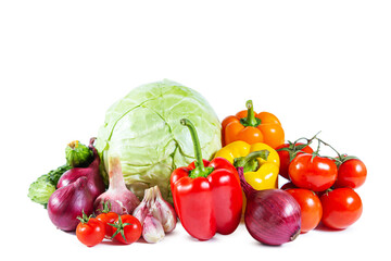 Mix of colorful vegetables - bell pepper, cabbage, tomatoes, cucumbers, onions and garlic. Isolated on white.