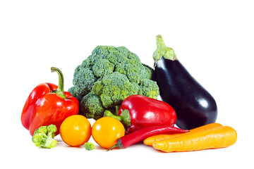Fresh shiny multicolored vegetables isolated on white background.