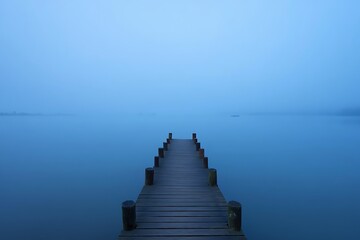 Serene Mist-Shrouded Pier A Tranquil Lake Landscape Photograph