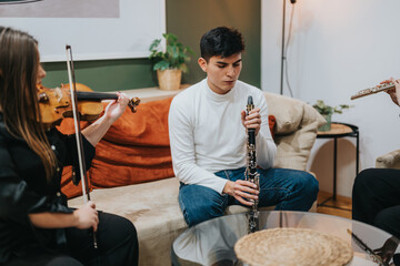 Young musicians gather indoors, playing string and woodwind instruments, enjoying a relaxed musical...