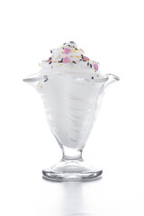 Whipped Cream Delight with Sprinkles isolated on white background