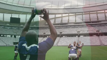 Rugby player2 signaling throw animating ball path while lifters lifting jumper securing possession - Powered by Adobe